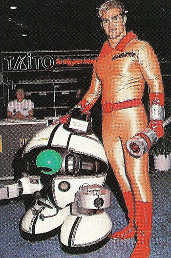 Wanted: Blast Hardcheese type model to wander around convention in orange superhero suit. This is not a prank.
