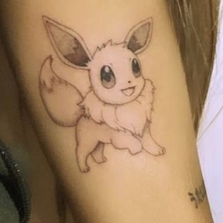 Ariana Grande Stans Eevee in Latest Tattoo - Interest ...