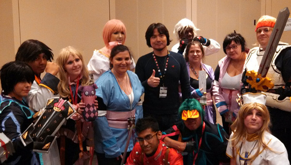 Center: Tales series producer Hideo Baba. Everywhere else: Tales cosplayers.