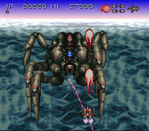 And there's this cool stage where there's LAVA and you get a WIND LASER and there's a face in the background of this spider-boss battle.